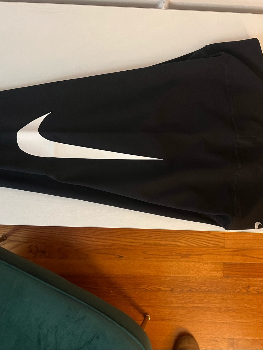 Nike women’s Black Leggings with White Swoosh
